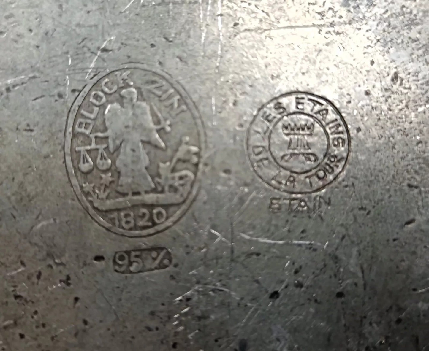 Soft oxidation on pewter surface detail

