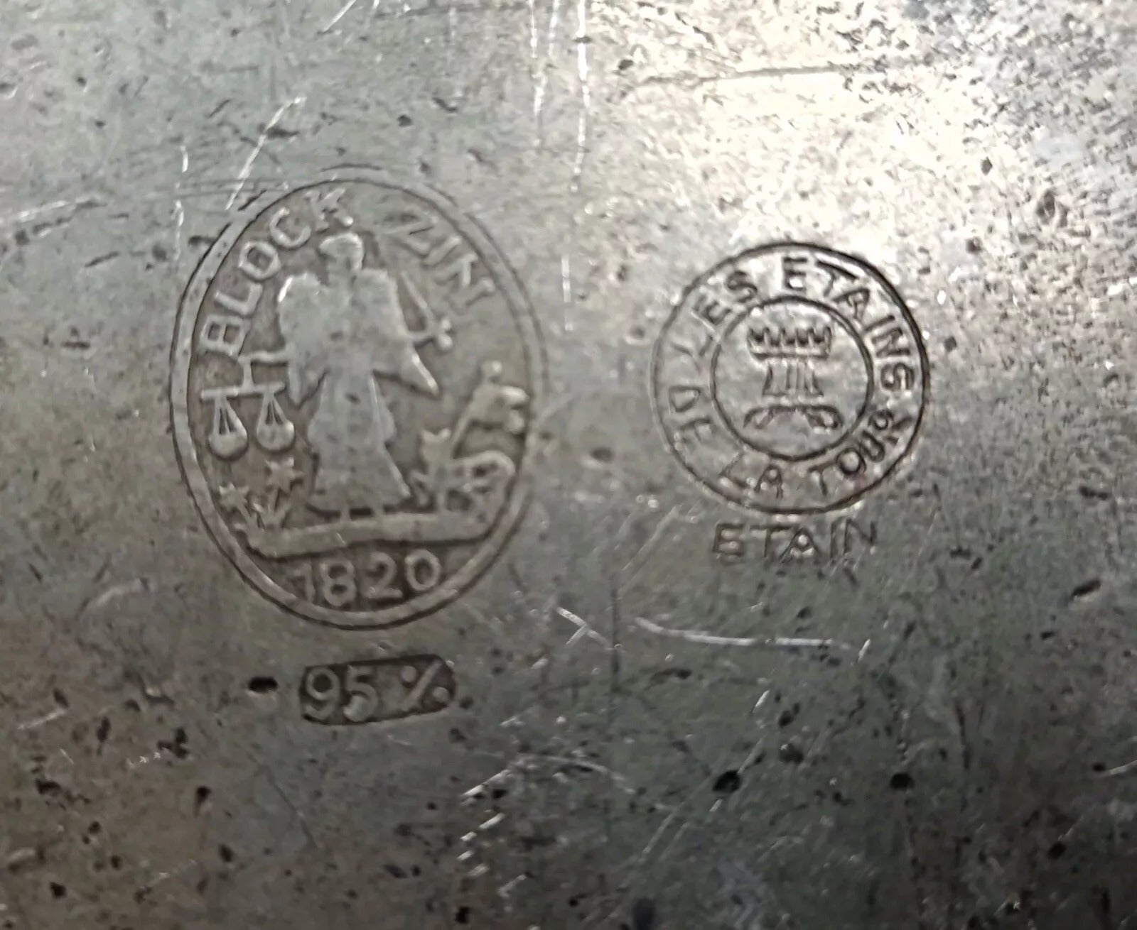 Soft oxidation on pewter surface detail

