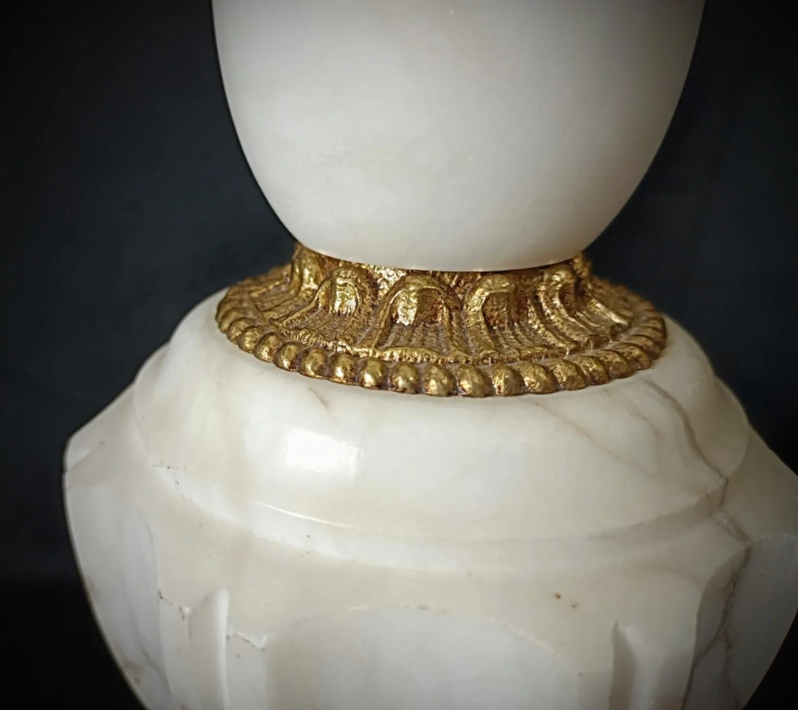 Close-up of alabaster stone texture and minor chips

