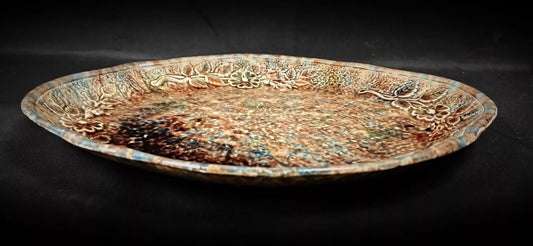 Beautiful floral design detail on ceramic surface

