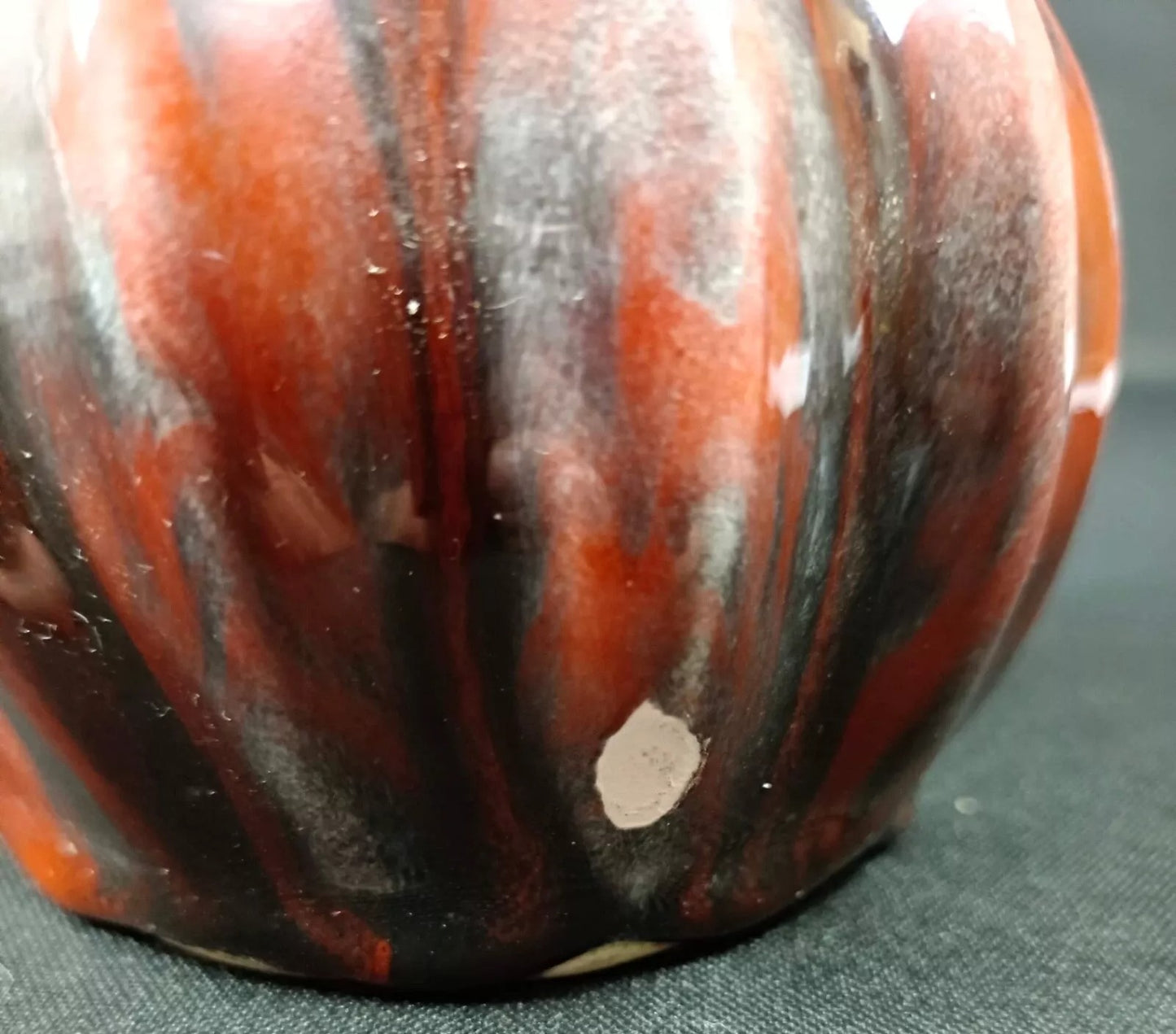 Base showing slight wear and manufacturing marks

