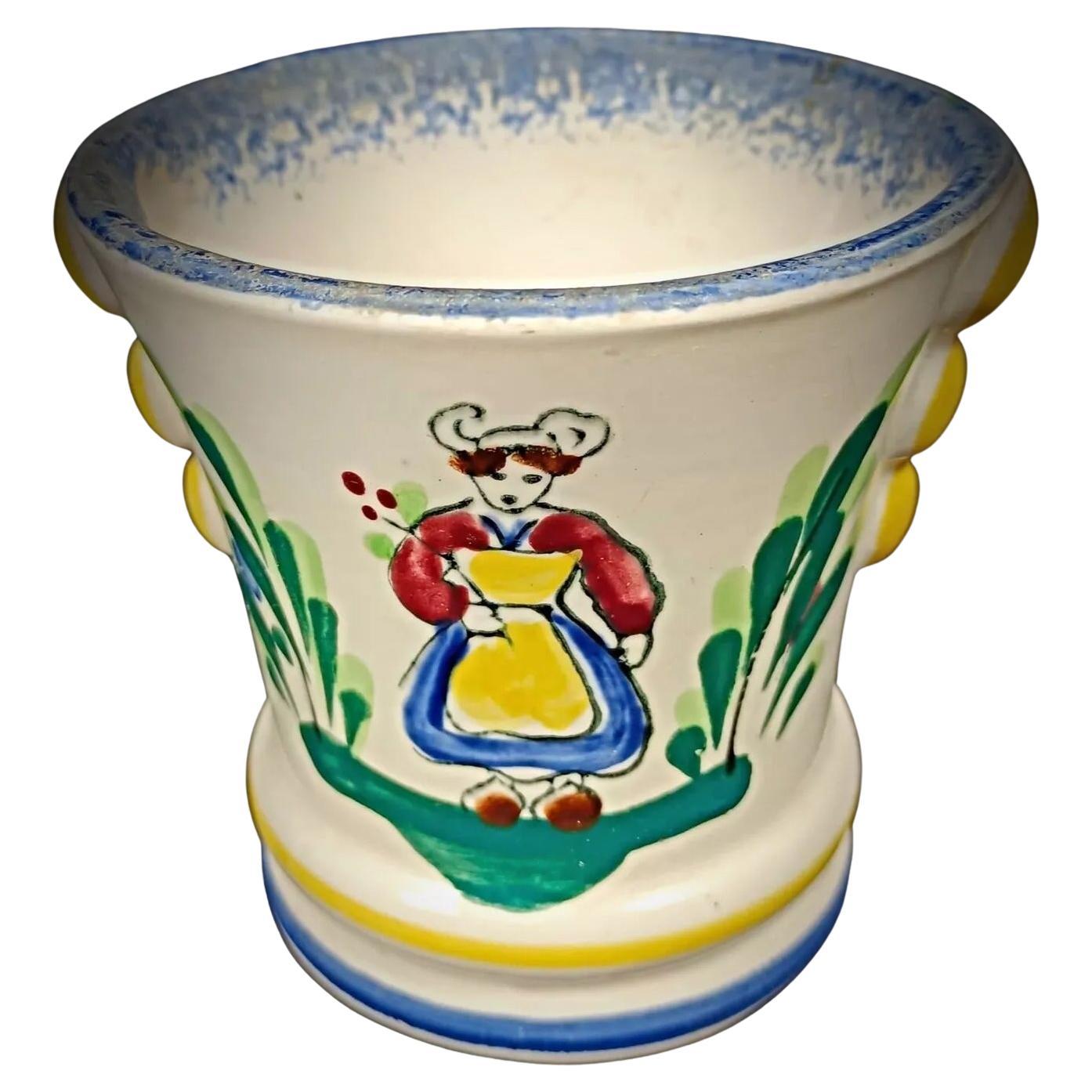 Vintage faience pot with Breton and floral design

