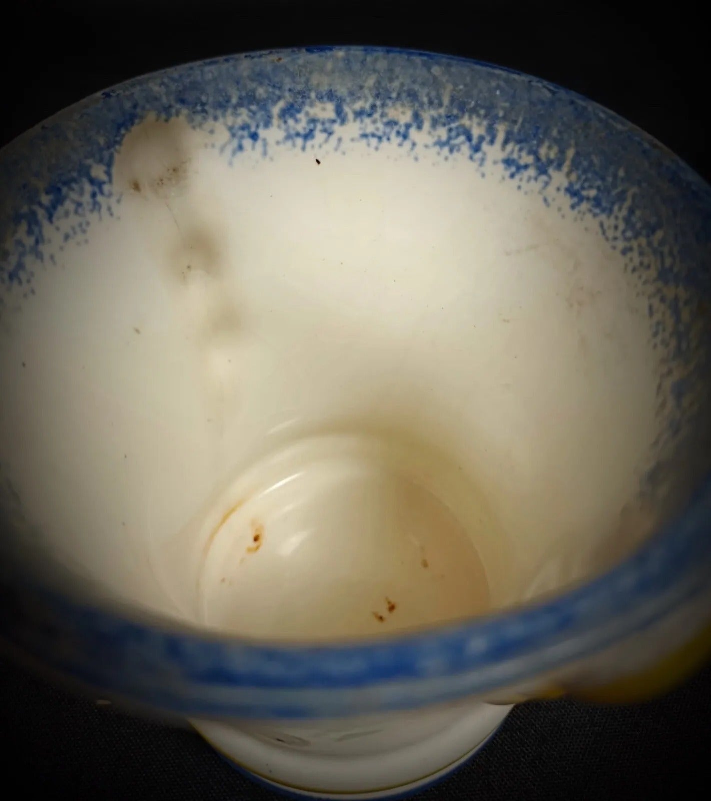 Detailed floral pattern elements on white glaze

