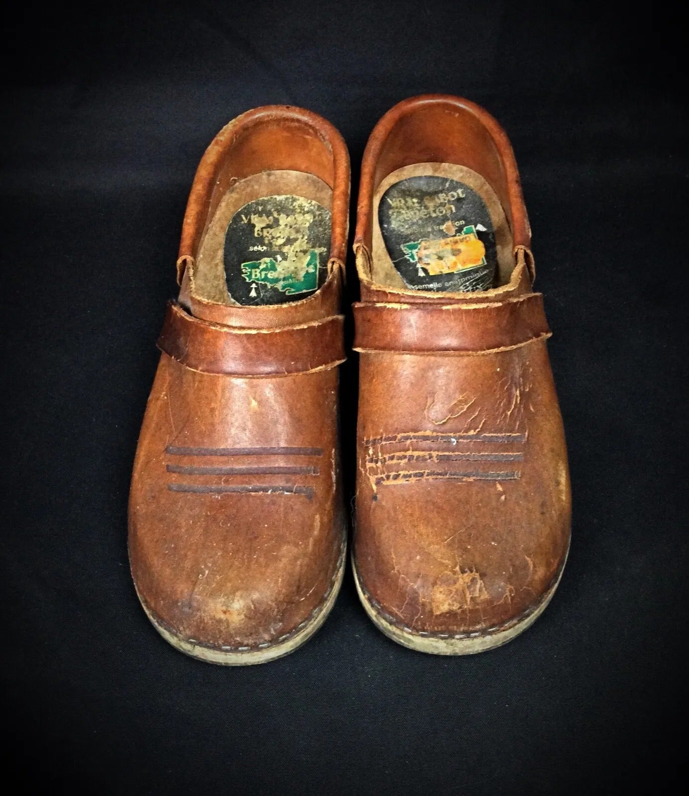 Genuine leather upper with minor scuff details

