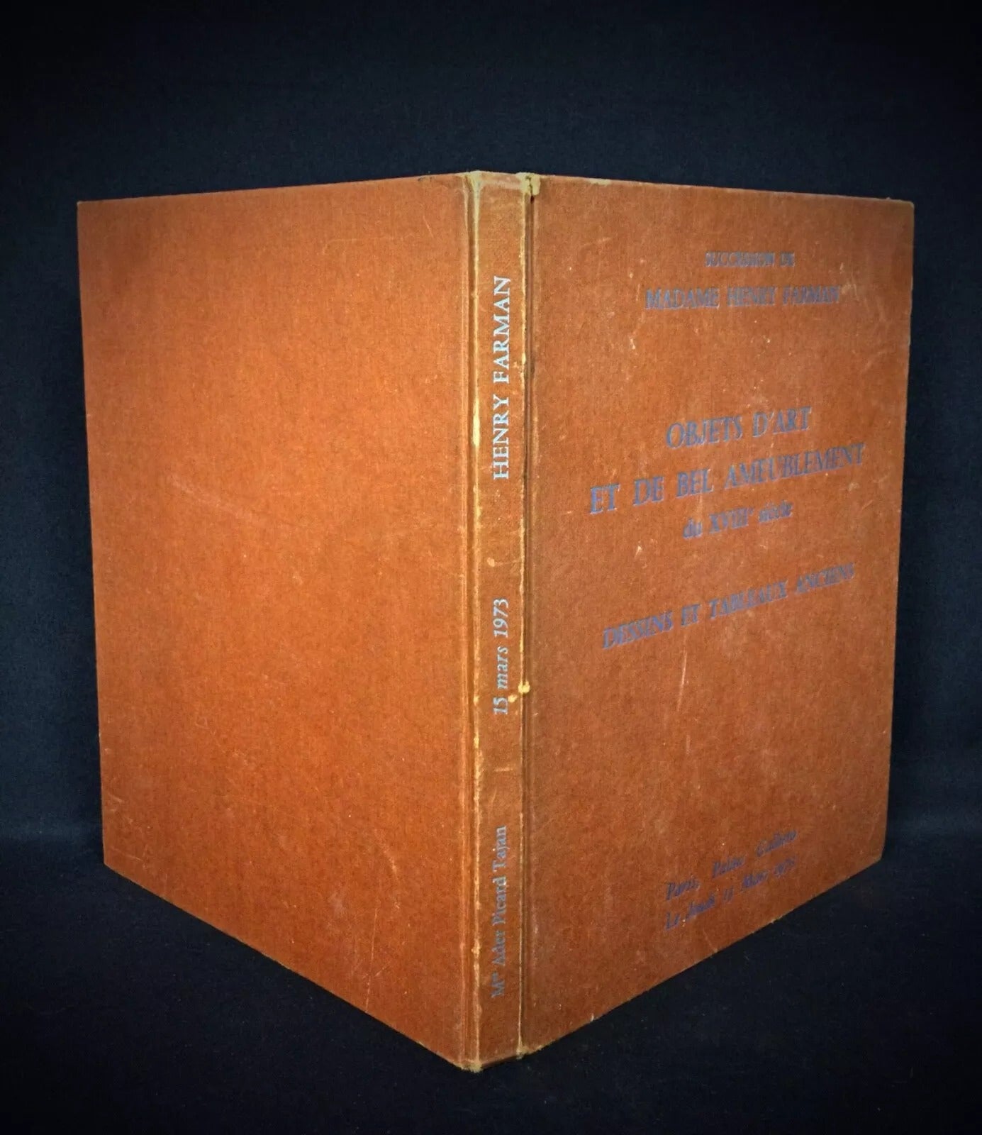 Spine showing title and light wear

