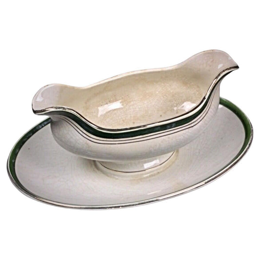 Front view of the vintage floral Digoin Sarreguemines gravy boat

