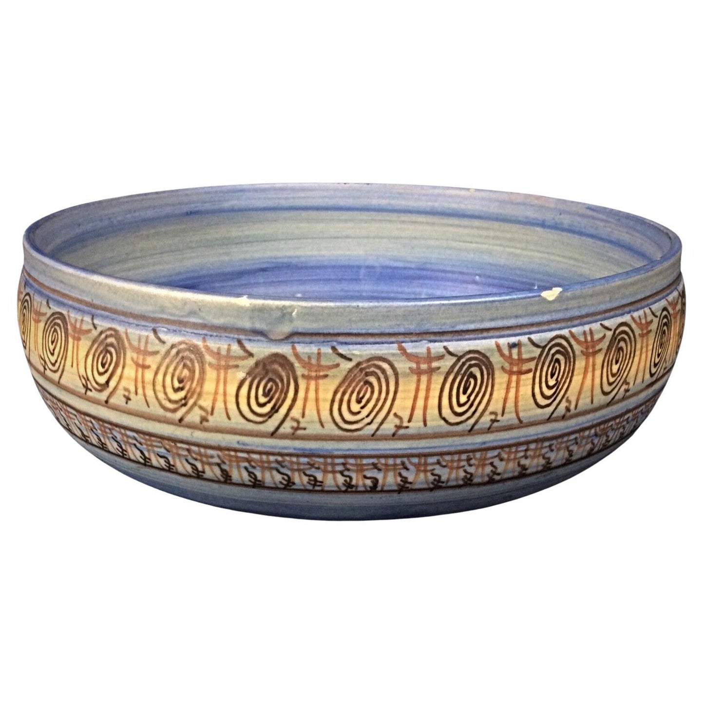 Top-down view of the antique Vallauris bowl showing the full interior and drip glaze.


