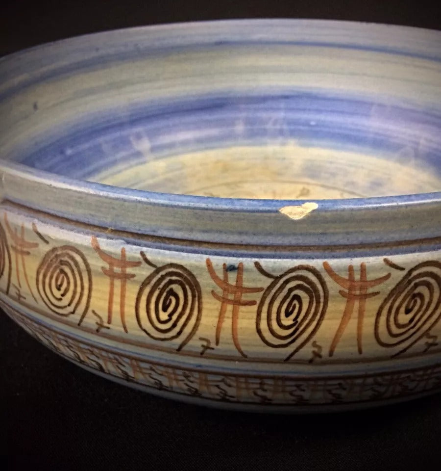 Side profile of the large bowl showcasing its organic, asymmetrical form.

