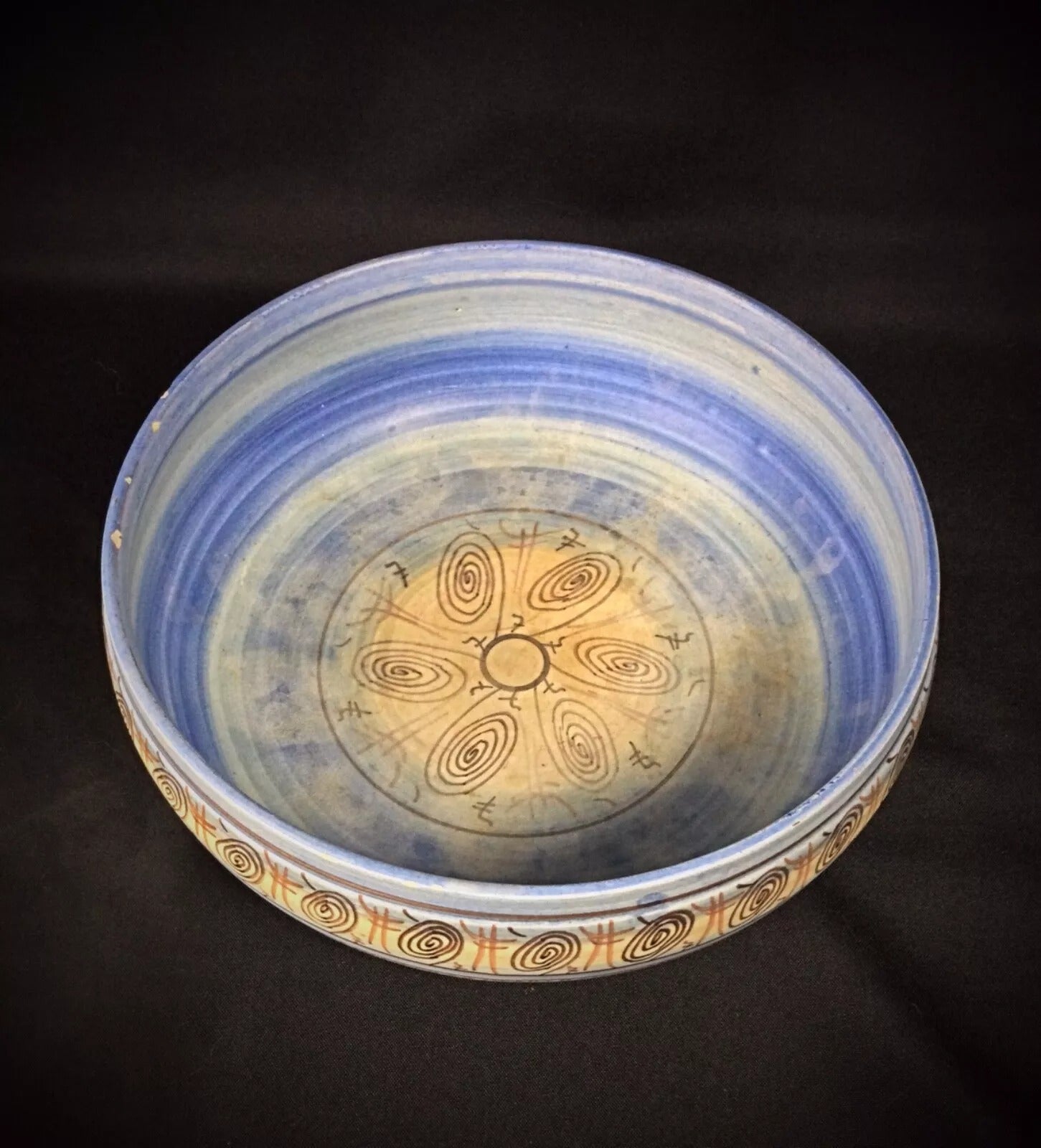 Detail of the glaze pooling and variegation inside the bowl's center.

