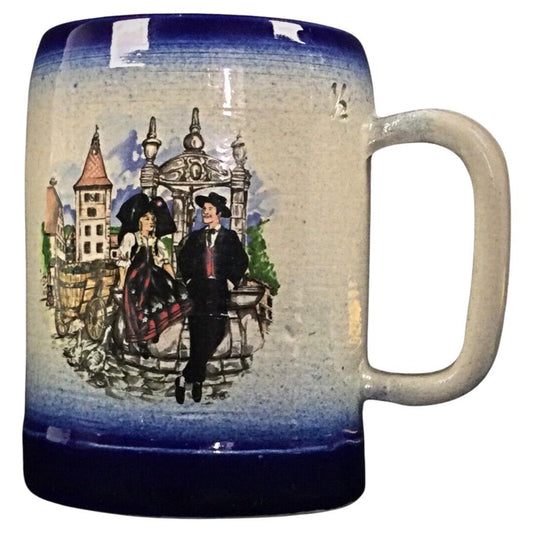 Front view of the Alsace stoneware mug showing the full hand-painted floral design.

