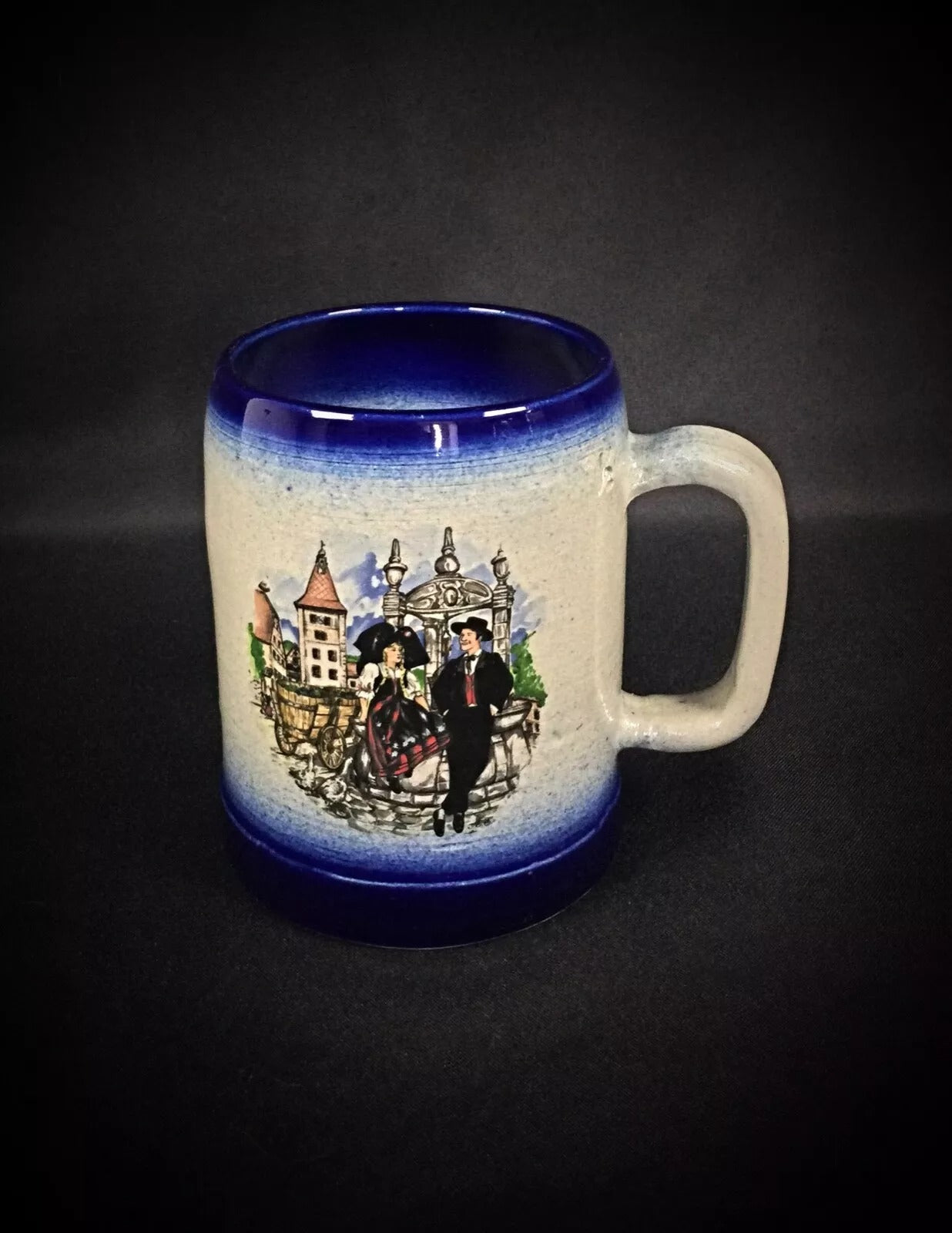 Top-down view into the mug, showing the cream-colored glazed interior.

