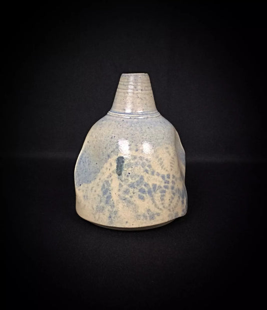 Close-up detail of the hand-painted floral spray in cobalt blue

