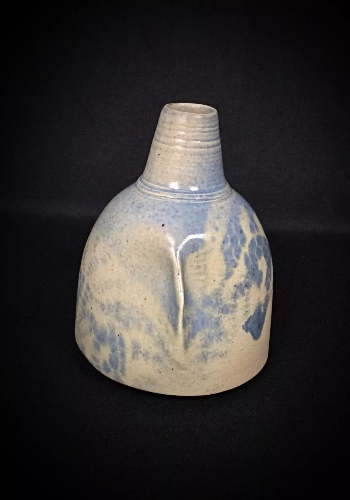 Detail of the scrolling foliate patterns and linear borders

