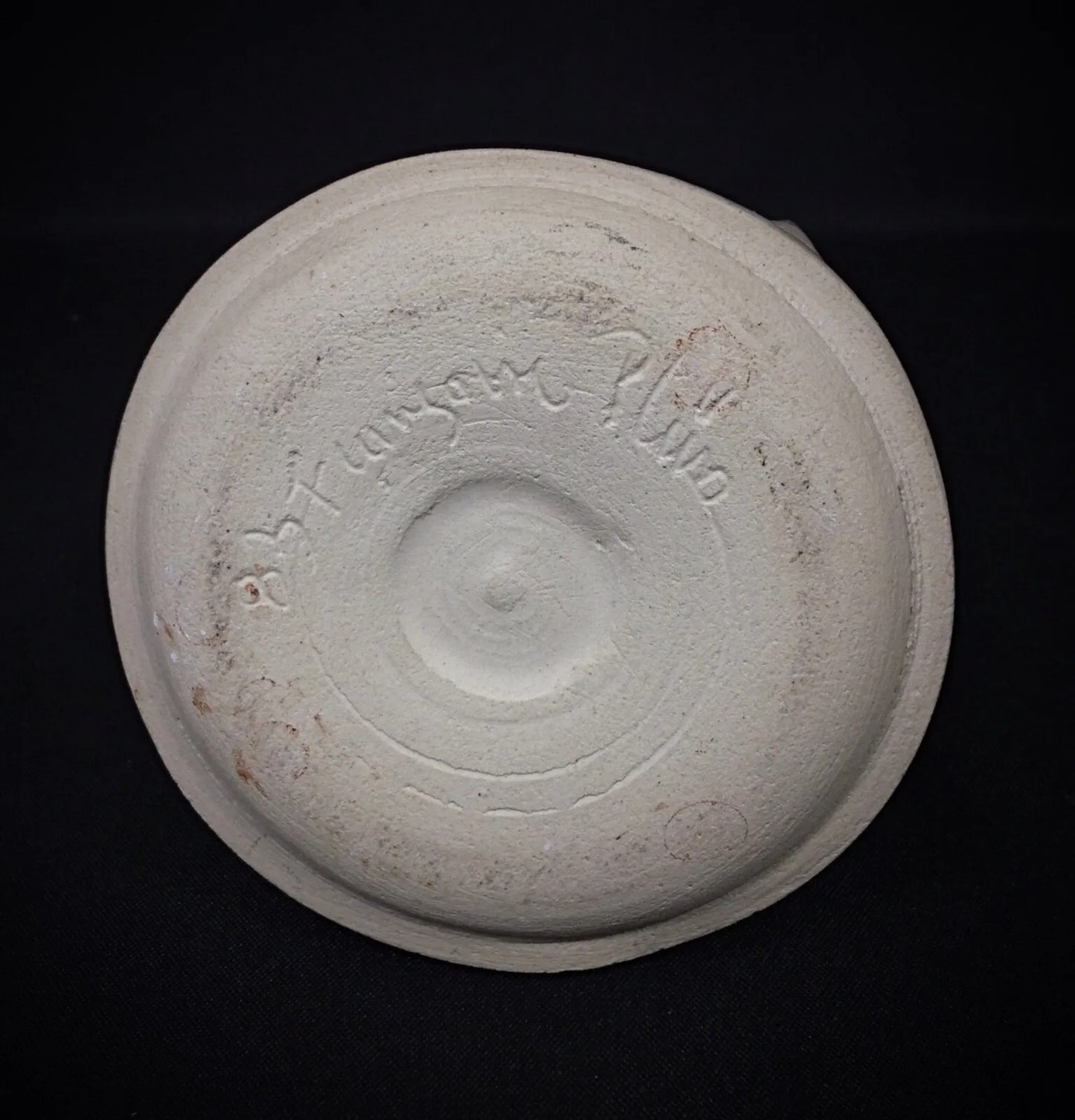 Top-down view showing the white glazed interior opening

