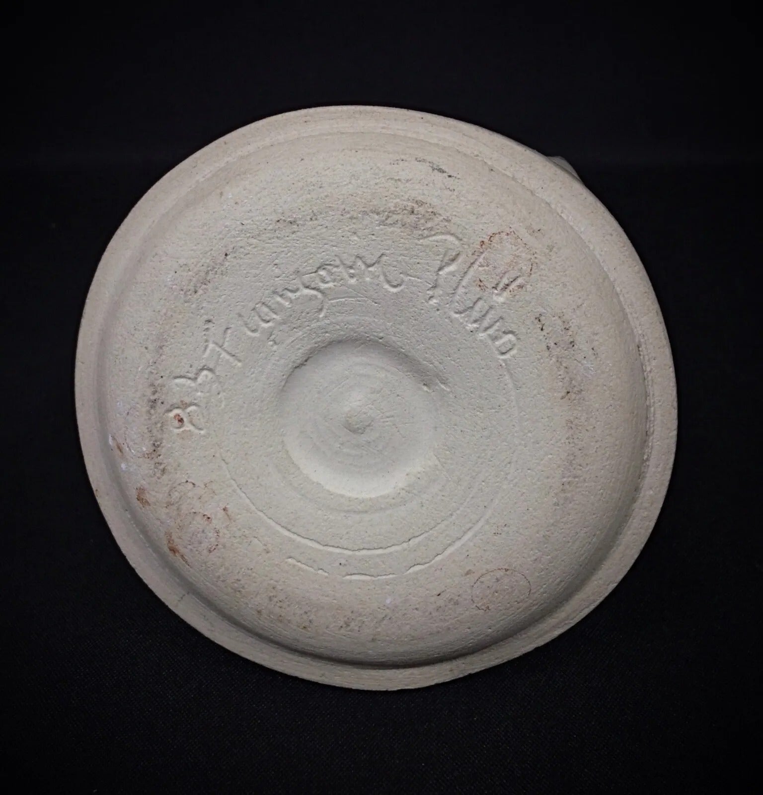 Top-down view showing the white glazed interior opening

