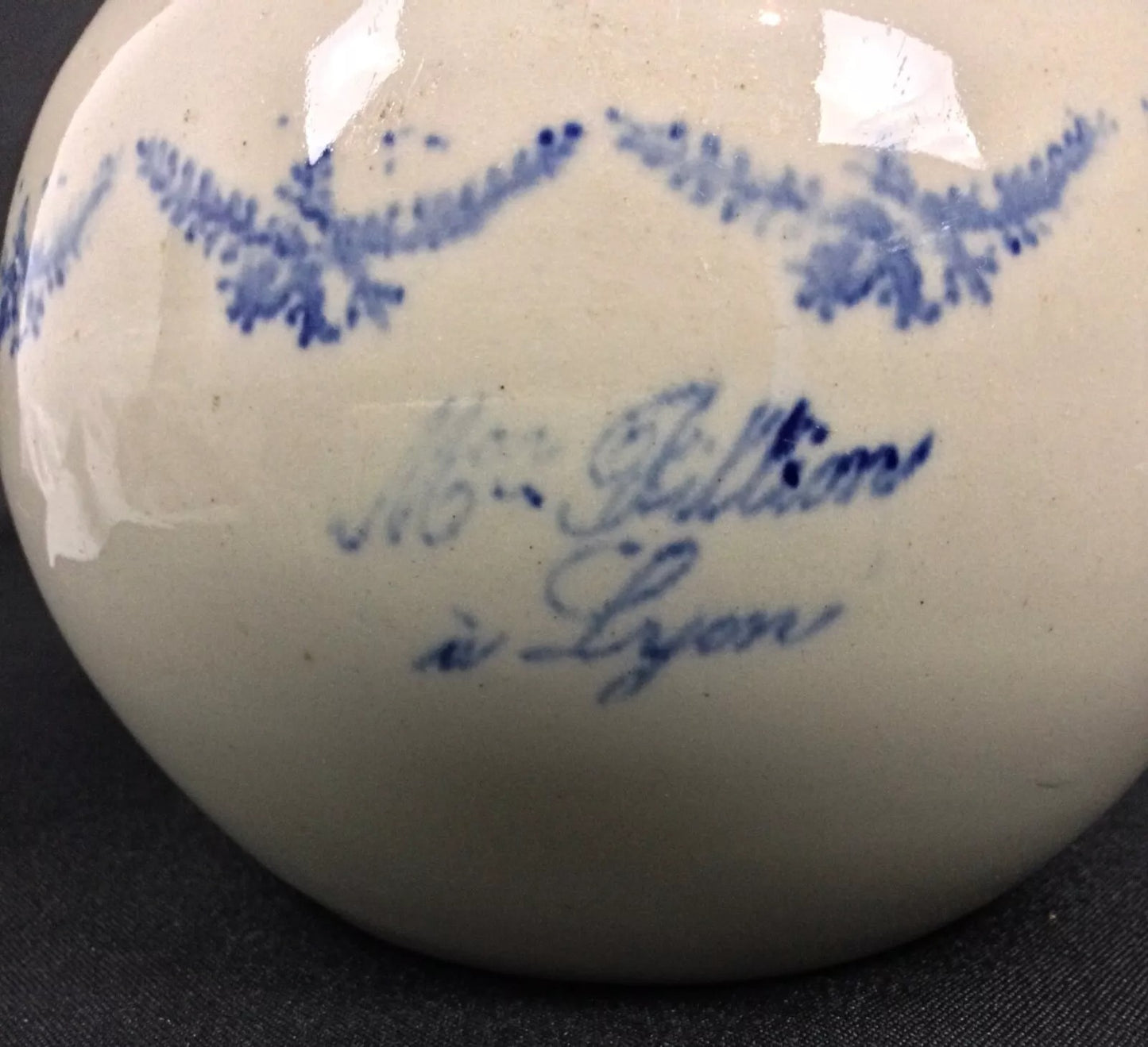 Side profile showing the pitcher's spout and handle shape

