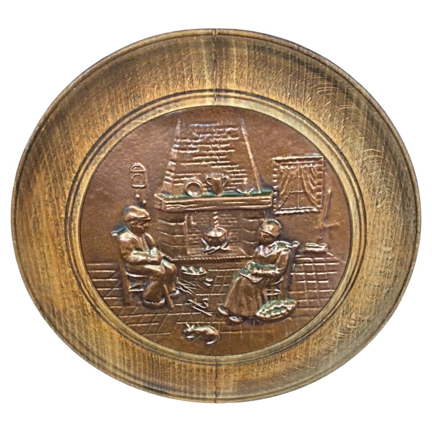 Vintage 20th century wall plate with intricate copper bas-reliefs on solid wood background by French artist Sénécal, 11.8 inch diameter