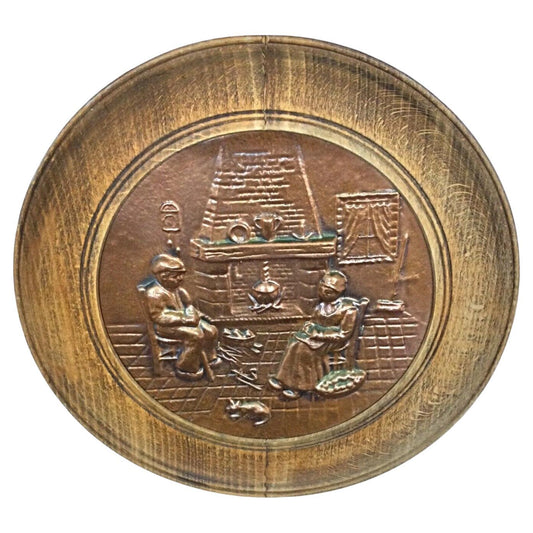 Vintage 20th century wall plate with intricate copper bas-reliefs on solid wood background by French artist Sénécal, 11.8 inch diameter