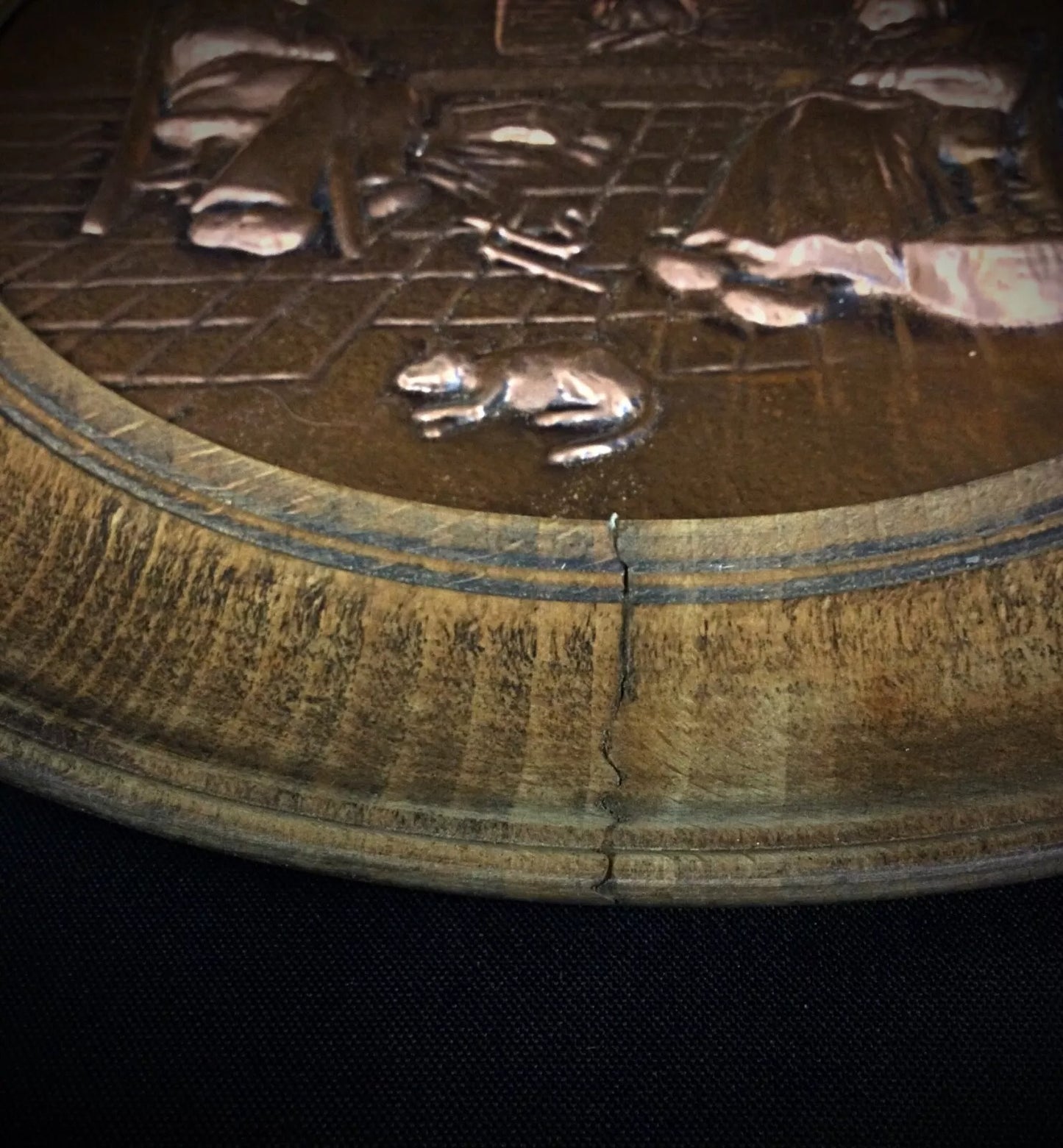 Full view of a vintage French copper and wood wall plaque featuring elegant bas-relief design and artistic patina