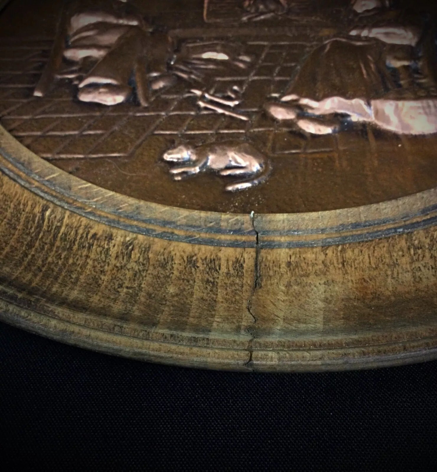 Full view of a vintage French copper and wood wall plaque featuring elegant bas-relief design and artistic patina