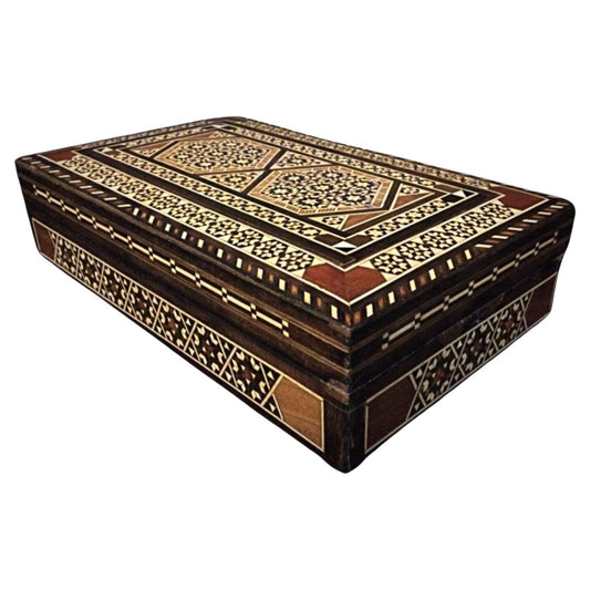 Handcrafted Syrian jewelry box with intricate marquetry inlay and a red velvet interior.
