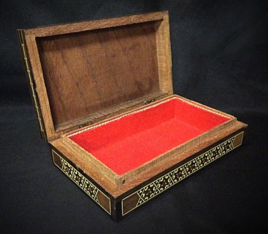 Top view of the rectangular marquetry jewelry box showcasing its geometric design.

