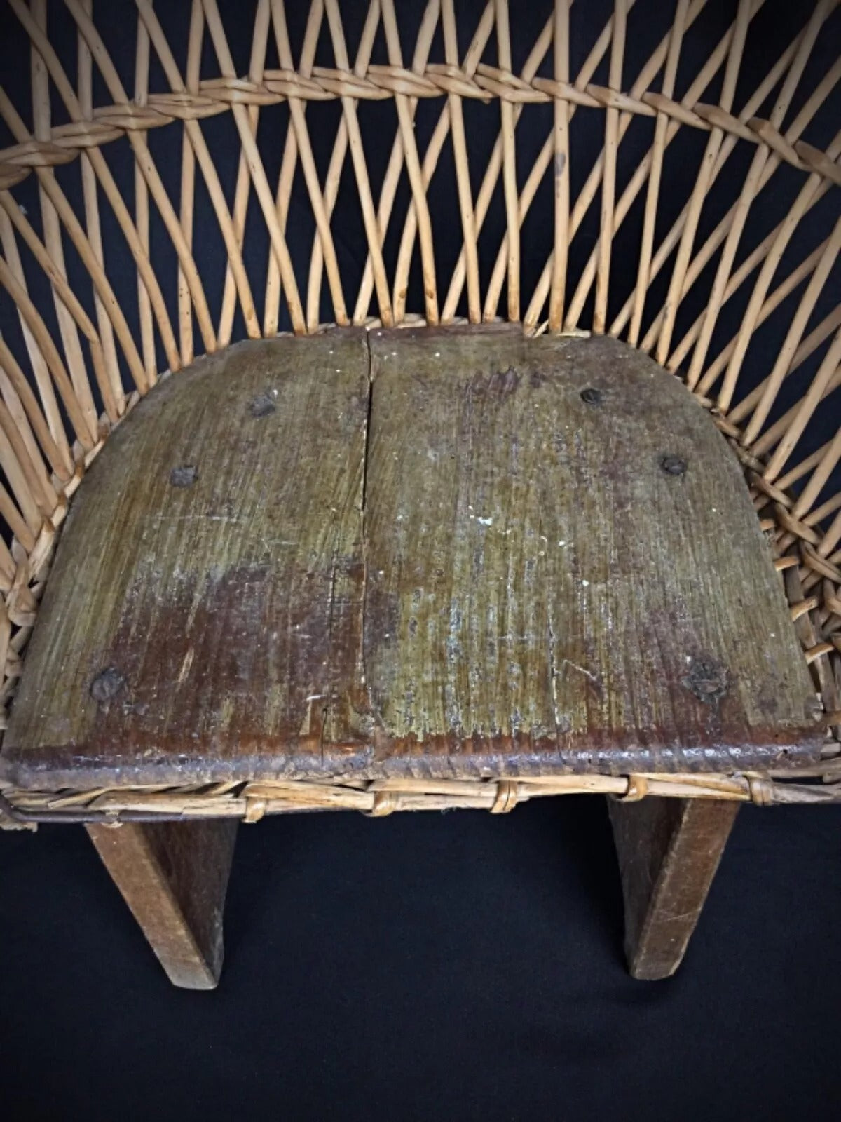 8. Close-up of wicker weave pattern and natural fiber texture on antique child's chair
