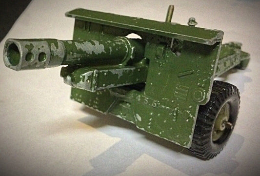 Close-up of the Crescent Toys logo on the vintage anti-tank cannon model
