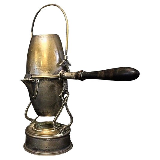 Antique Art Nouveau brass and copper coffee pot with ornate swing arm

