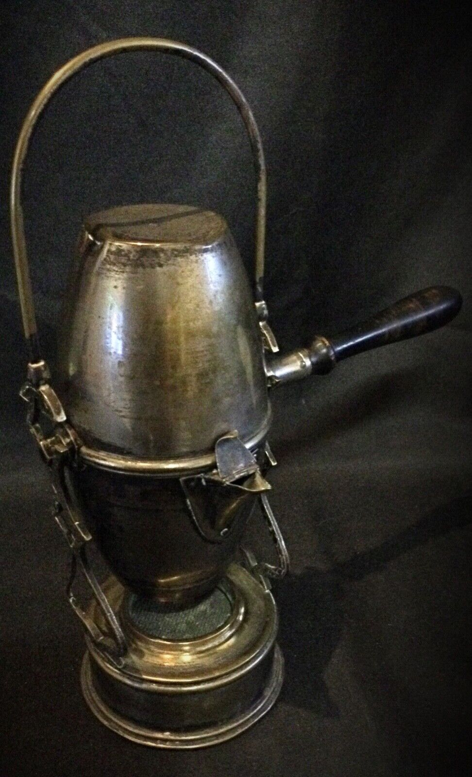 Art Nouveau coffee pot with a distinctive swinging arm for pouring
