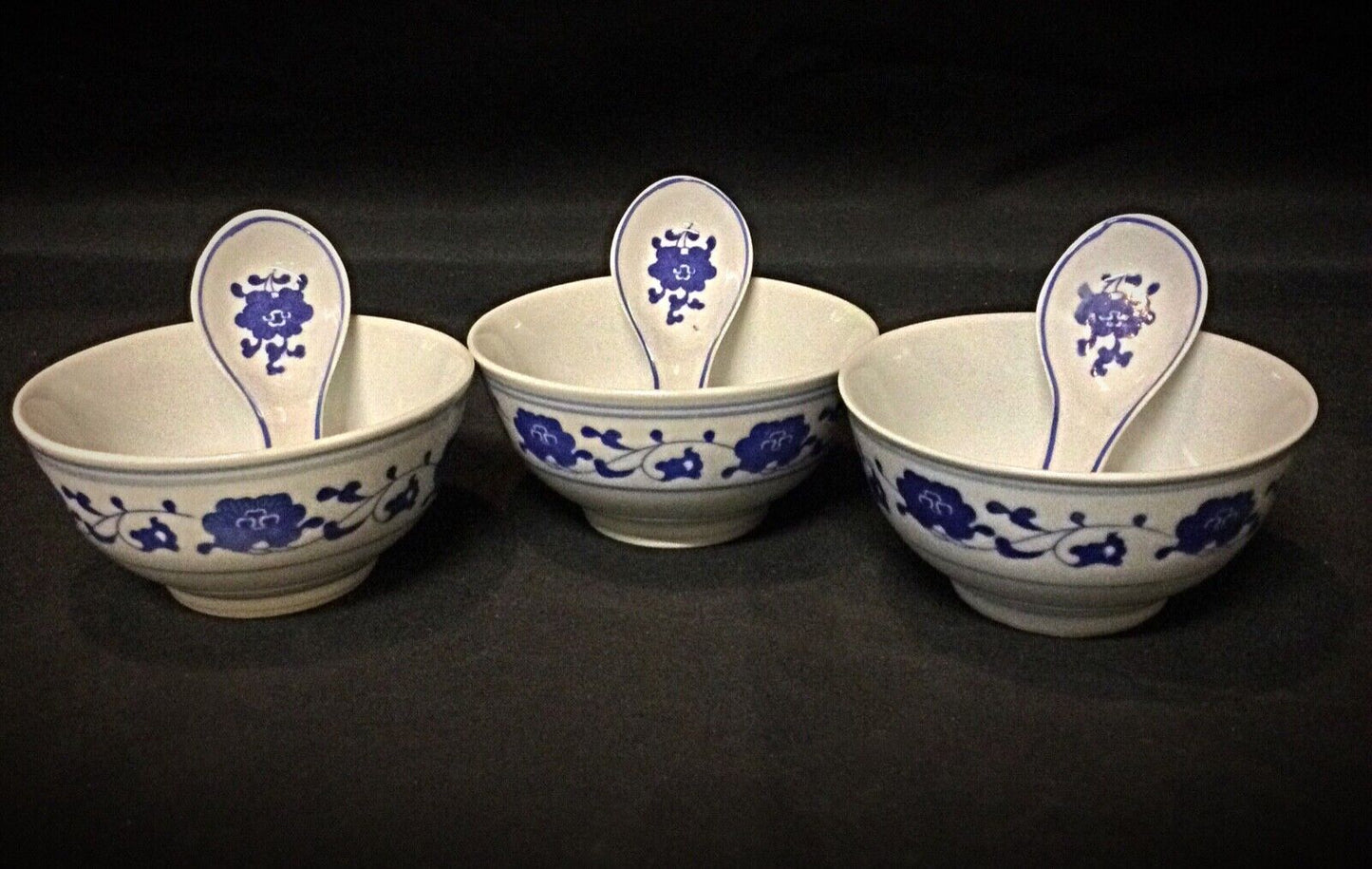 Close-up of traditional Asian porcelain rice bowls
