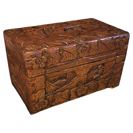 Hand-carved wooden bas-relief jewelry box with intricate detailing

