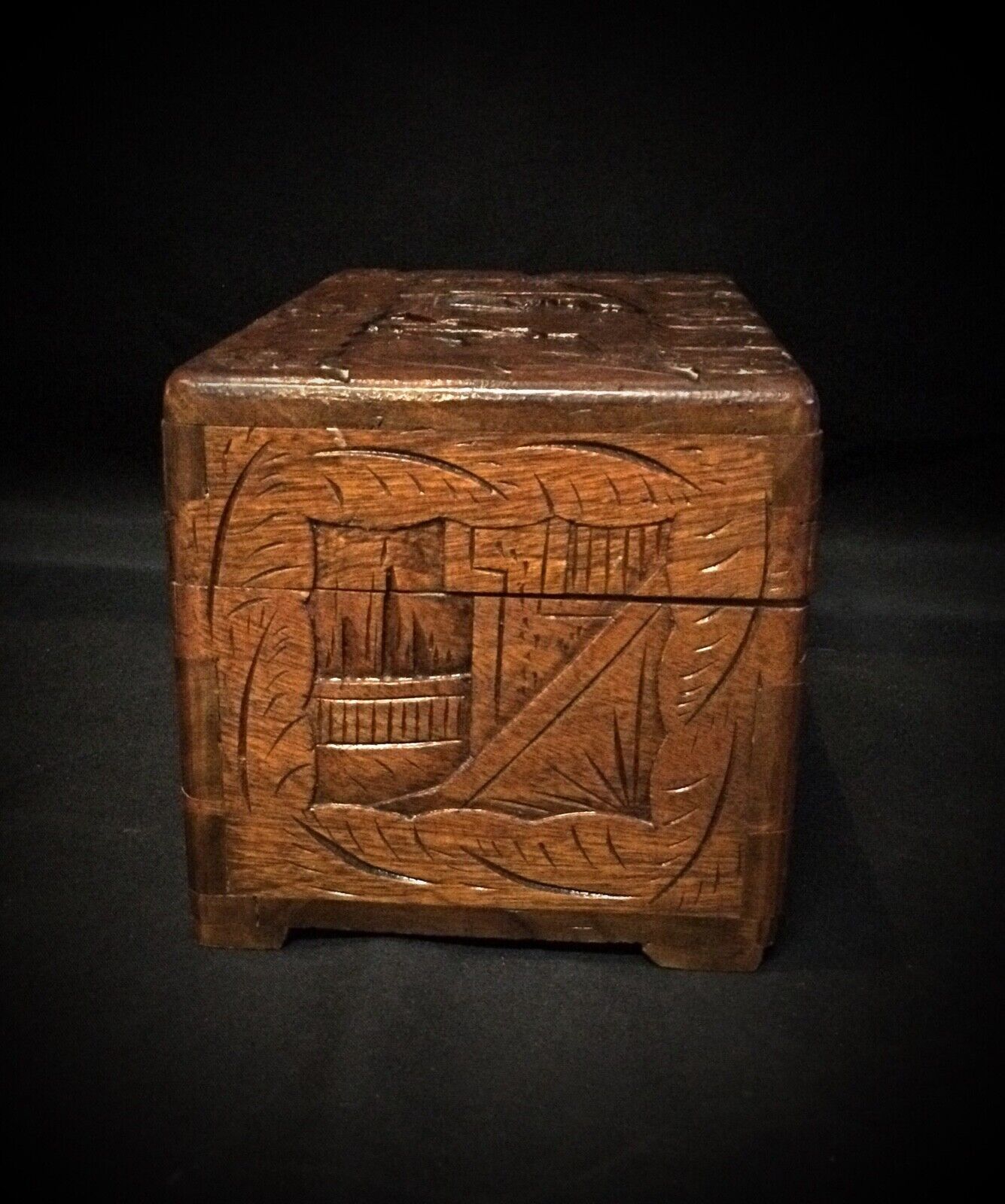 Antique-style wooden storage box with bas-relief pattern
