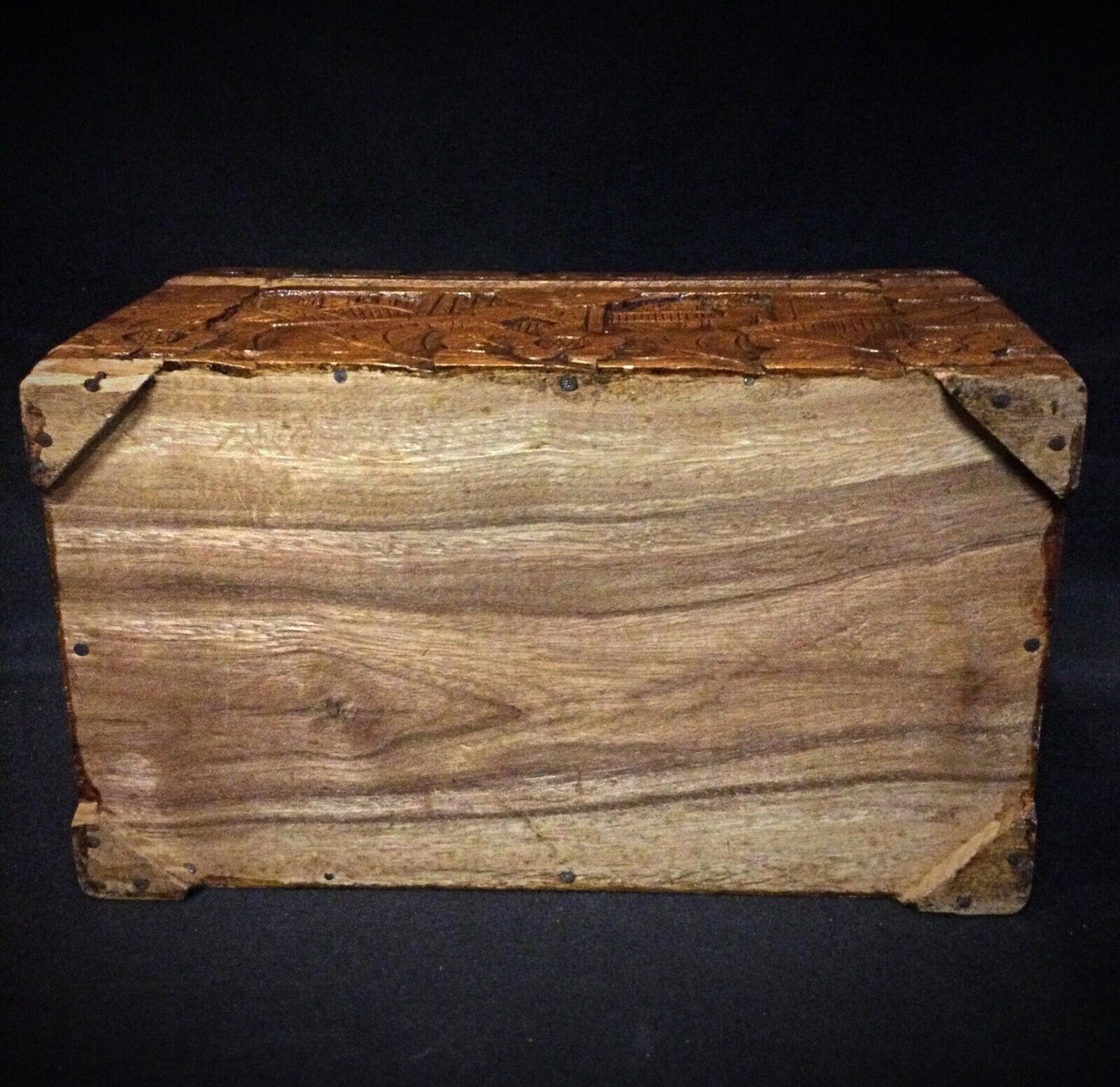 Vintage wooden trinket box with lid and elegant carving
