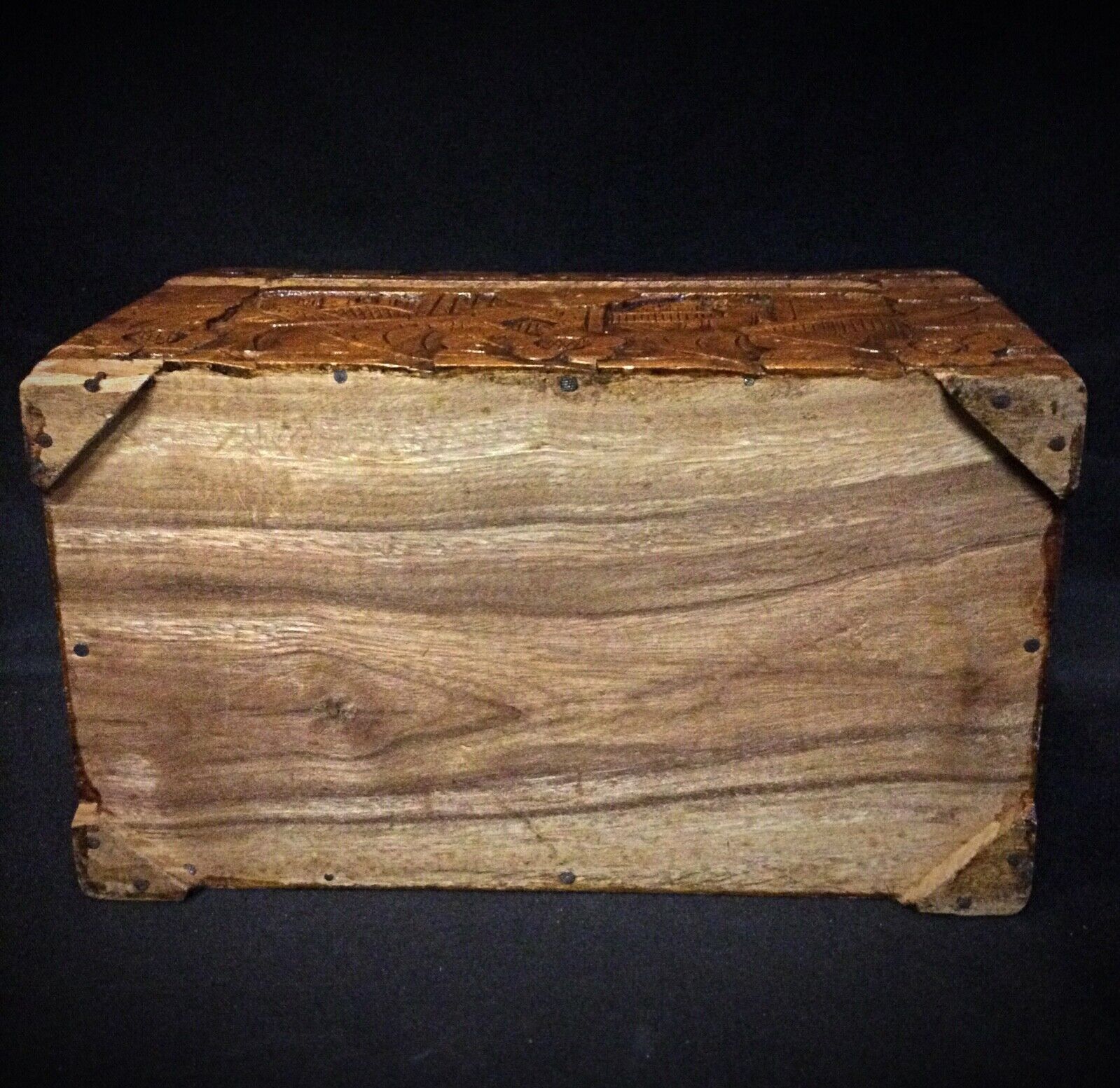 Vintage wooden trinket box with lid and elegant carving
