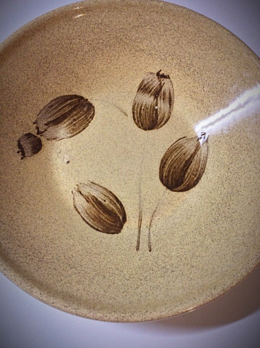 Close-up of floral pattern on a vintage Sarreguemines ceramic salad bowl

