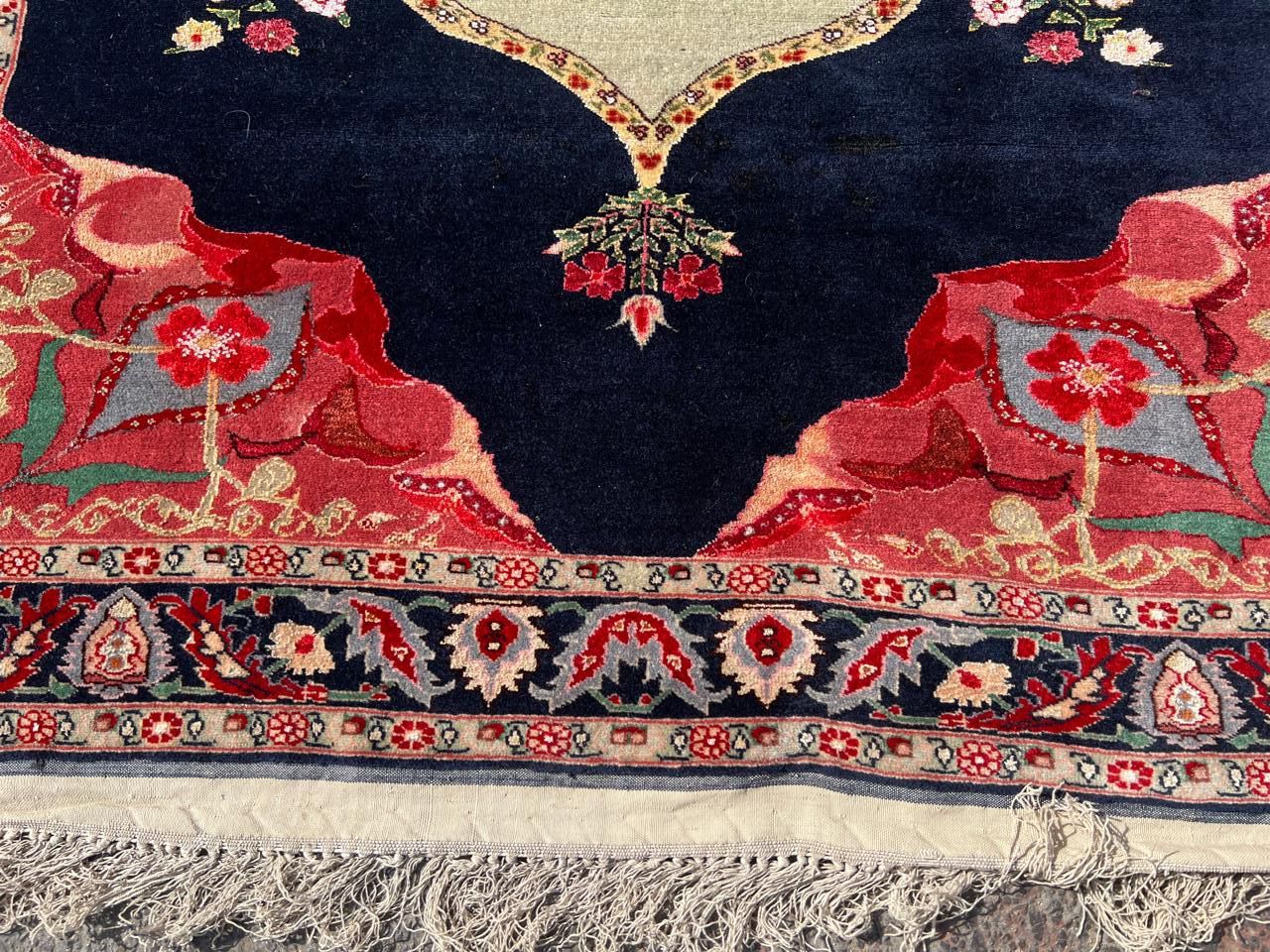 Corner view emphasizing medallion continuation and border design

