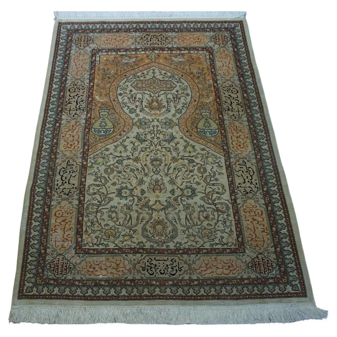 Handmade Vintage Turkish Hereke Silk Rug showcased in a luxurious living room setting