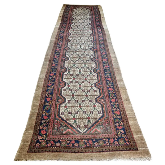 Handmade Antique Persian Camel Hair Runner Rug - 1900s - Cream-colored background with deep red geometric shapes and detailed floral motifs on rich navy border.