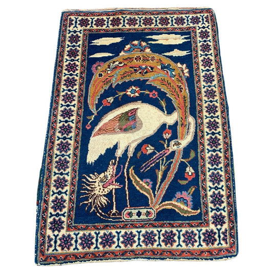 antique Persian Tabriz rug with mythical bird and dragon
