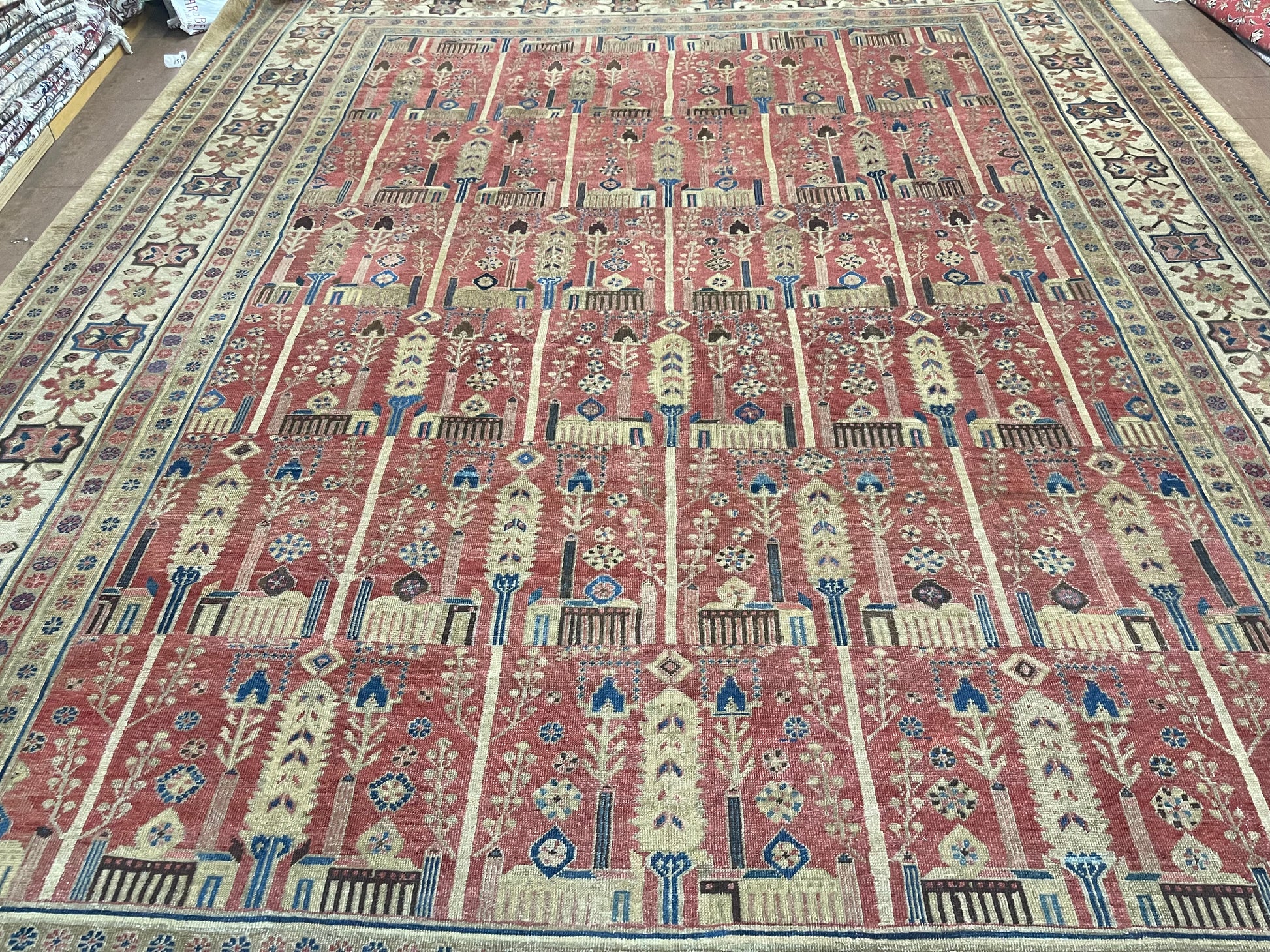 Front view of the palace-sized rug highlighting its harmonious blend of colors