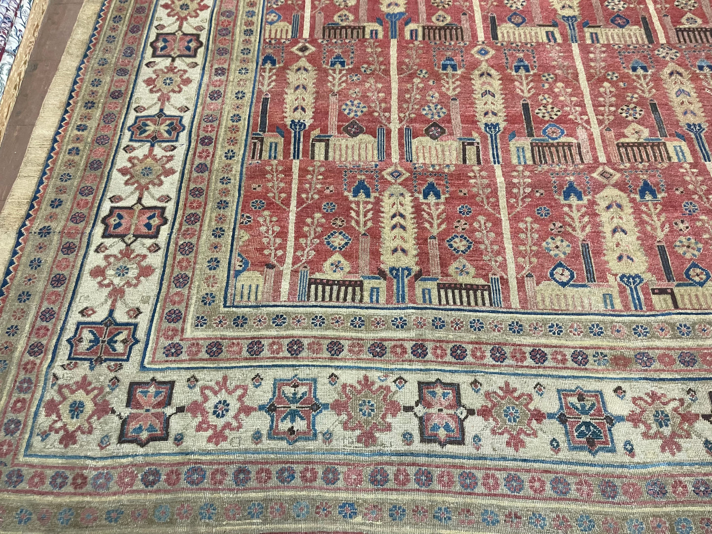 Angled shot of the palace-sized rug showcasing its symmetrical layout