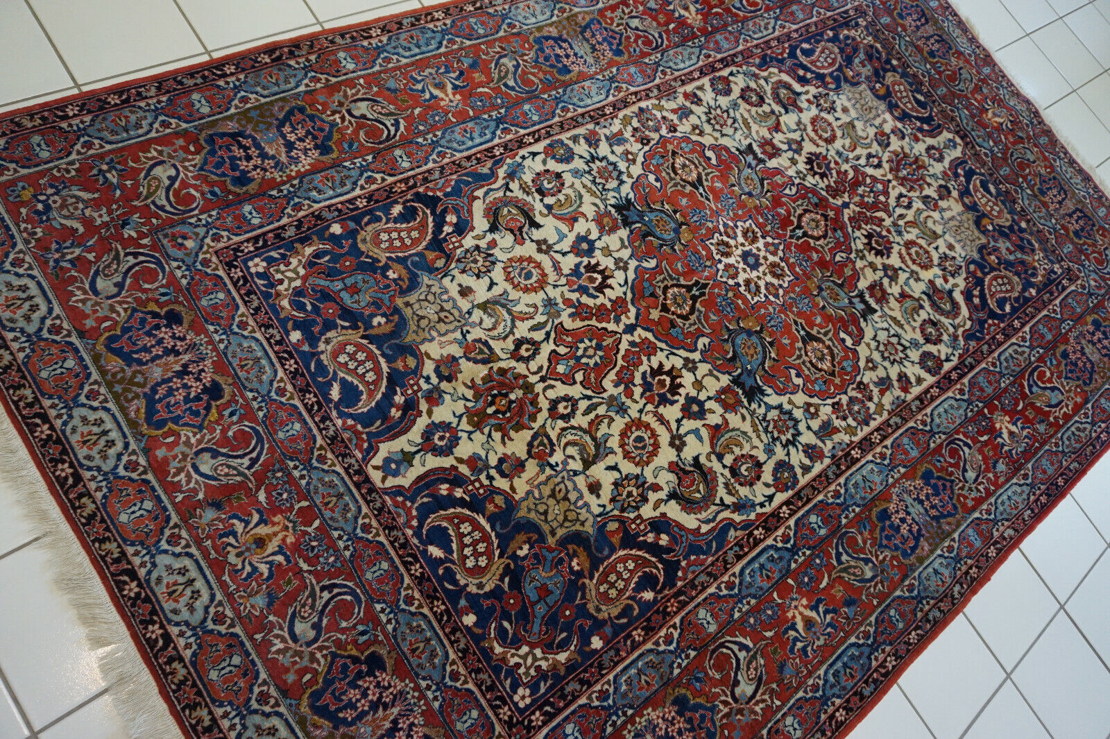 Close-up of the blues interspersed throughout the Handmade Antique Persian Style Isfahan Rug