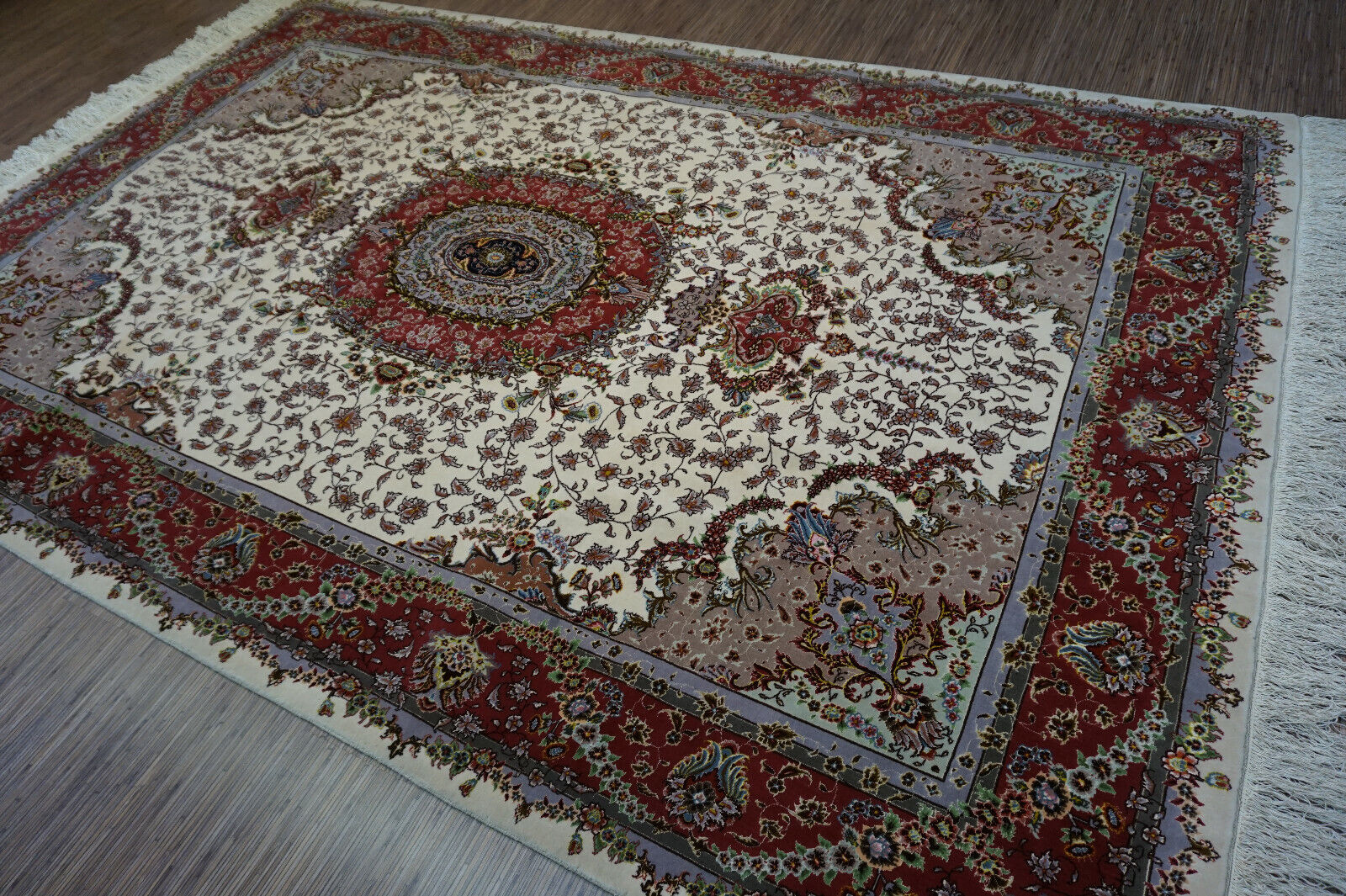 Detailed view of the intricate geometric patterns and texture variation on the rug