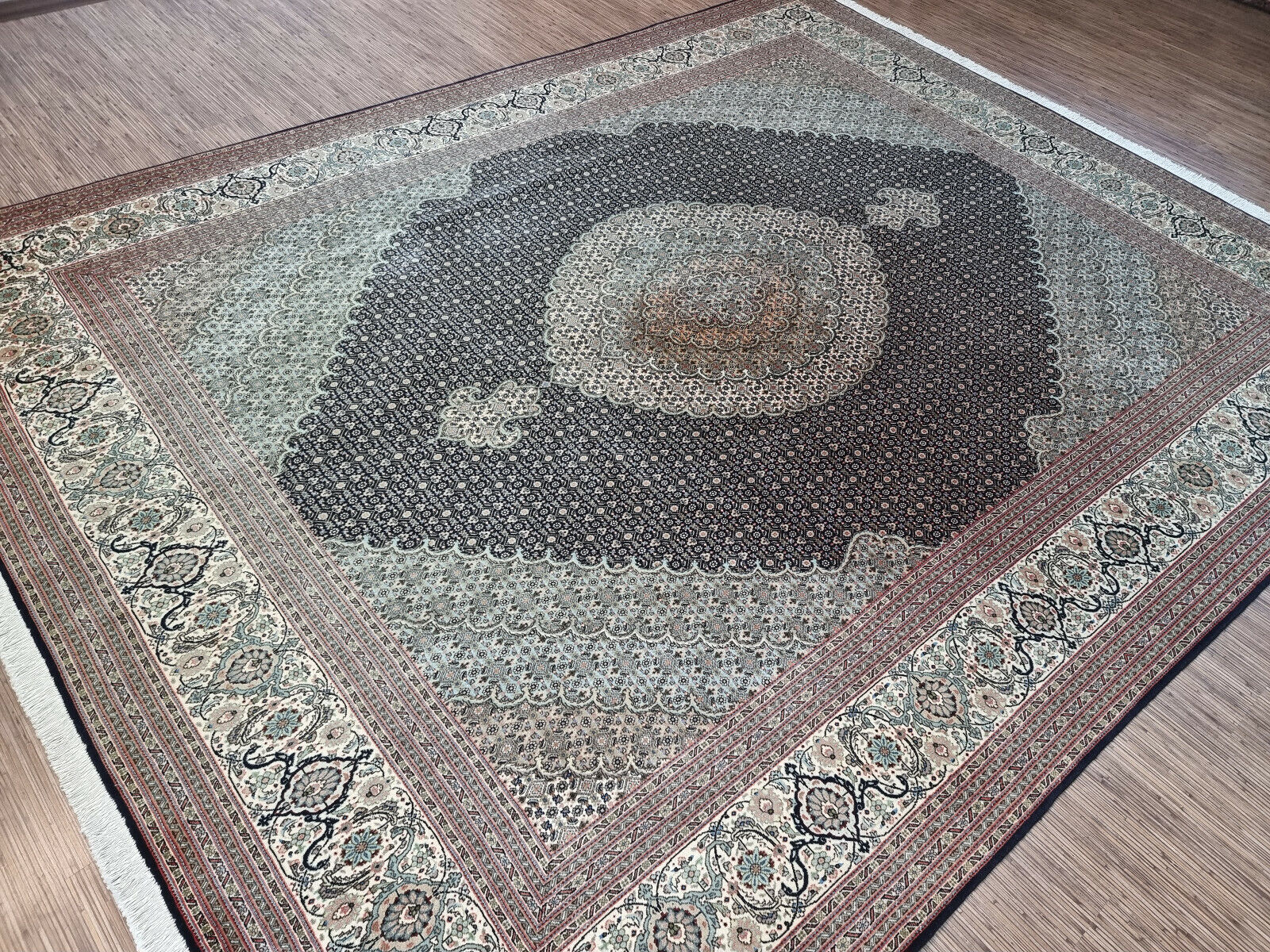  Front view of the Persian Tabriz rug enhancing the elegance of a living room