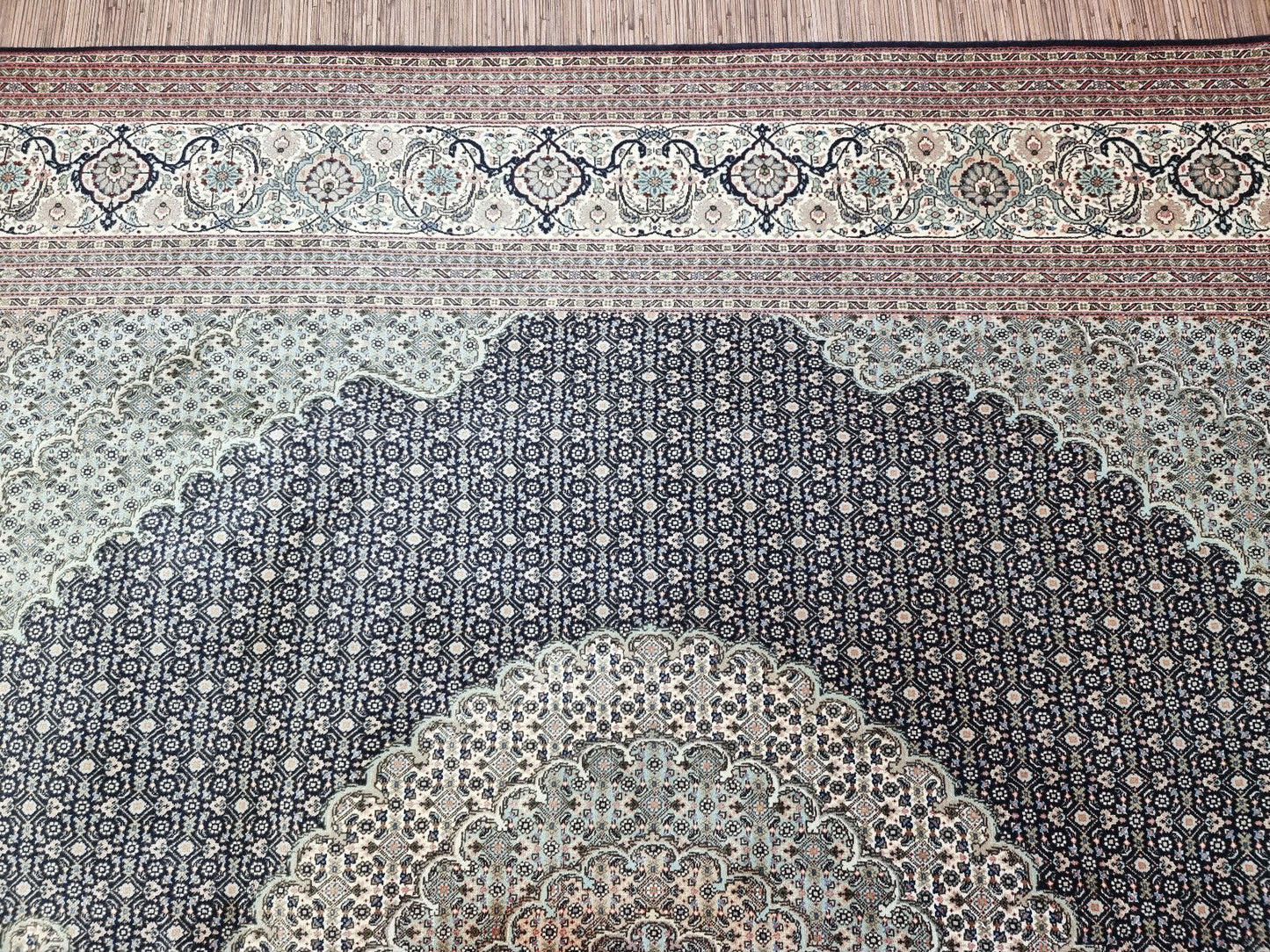 Overhead shot of the Tabriz 50 Raj rug demonstrating its generously sized dimensions
