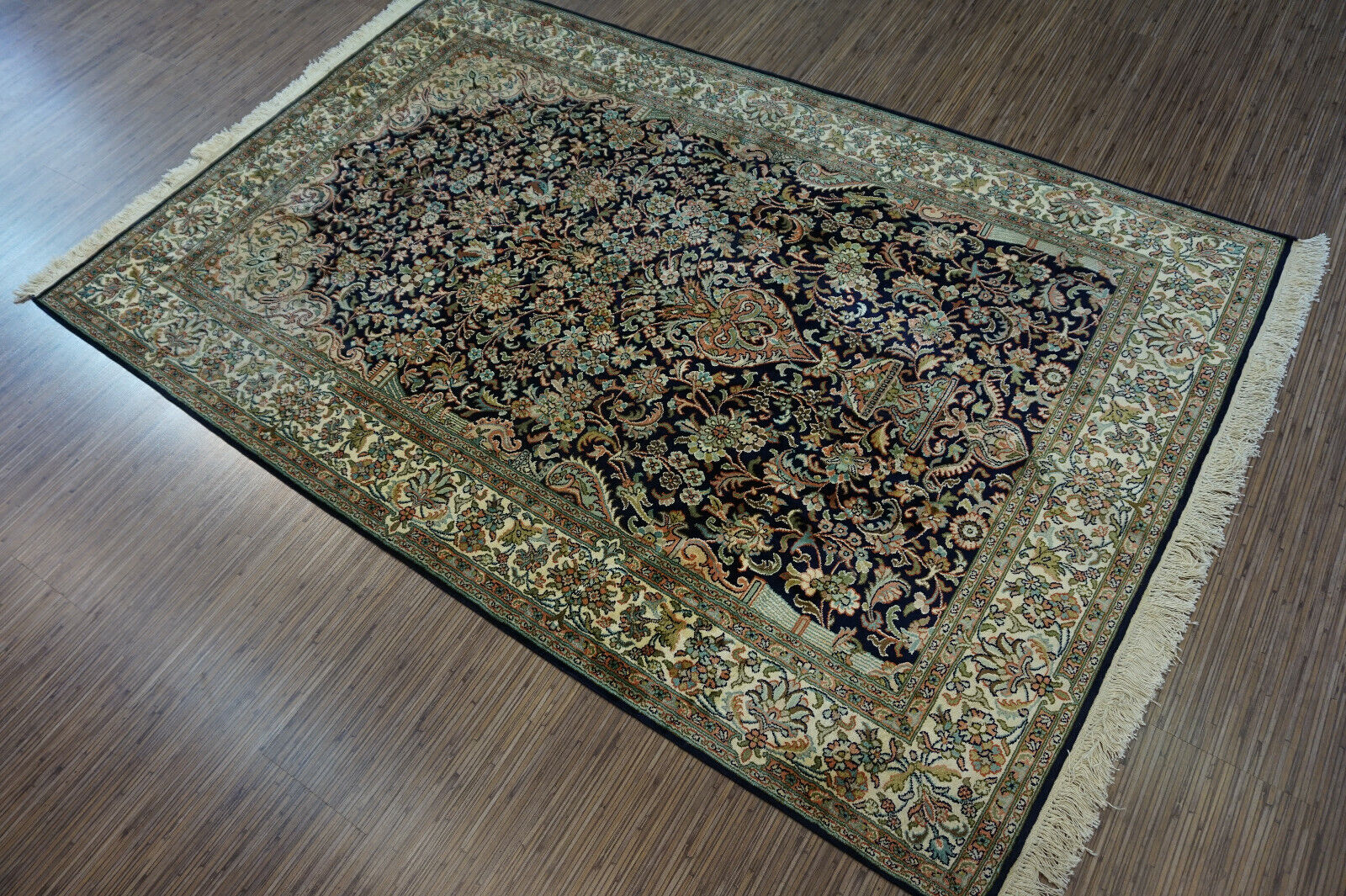 Detailed close-up of the silky texture inviting touch on the Handmade Vintage Persian Kashmir Rug