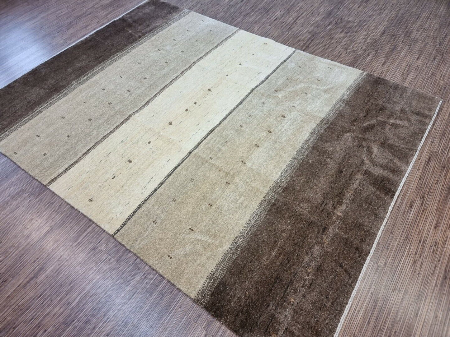 Detailed close-up of the thick woolen texture inviting touch on the Handmade Vintage Persian Style Gabbeh Rug