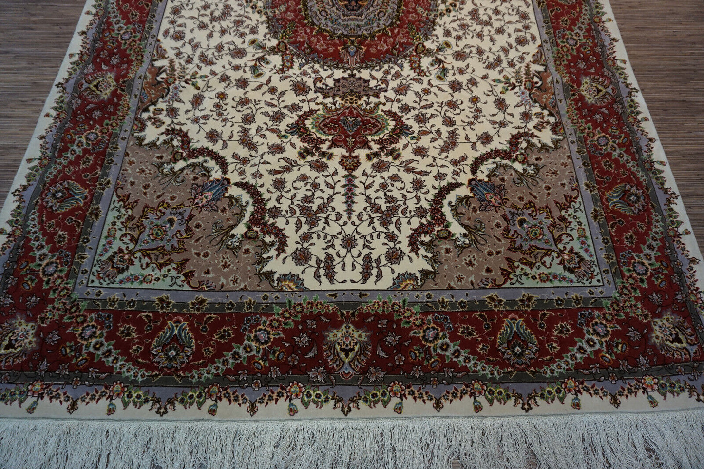 Overhead shot of the Persian Tabriz rug demonstrating its opulent silk blend