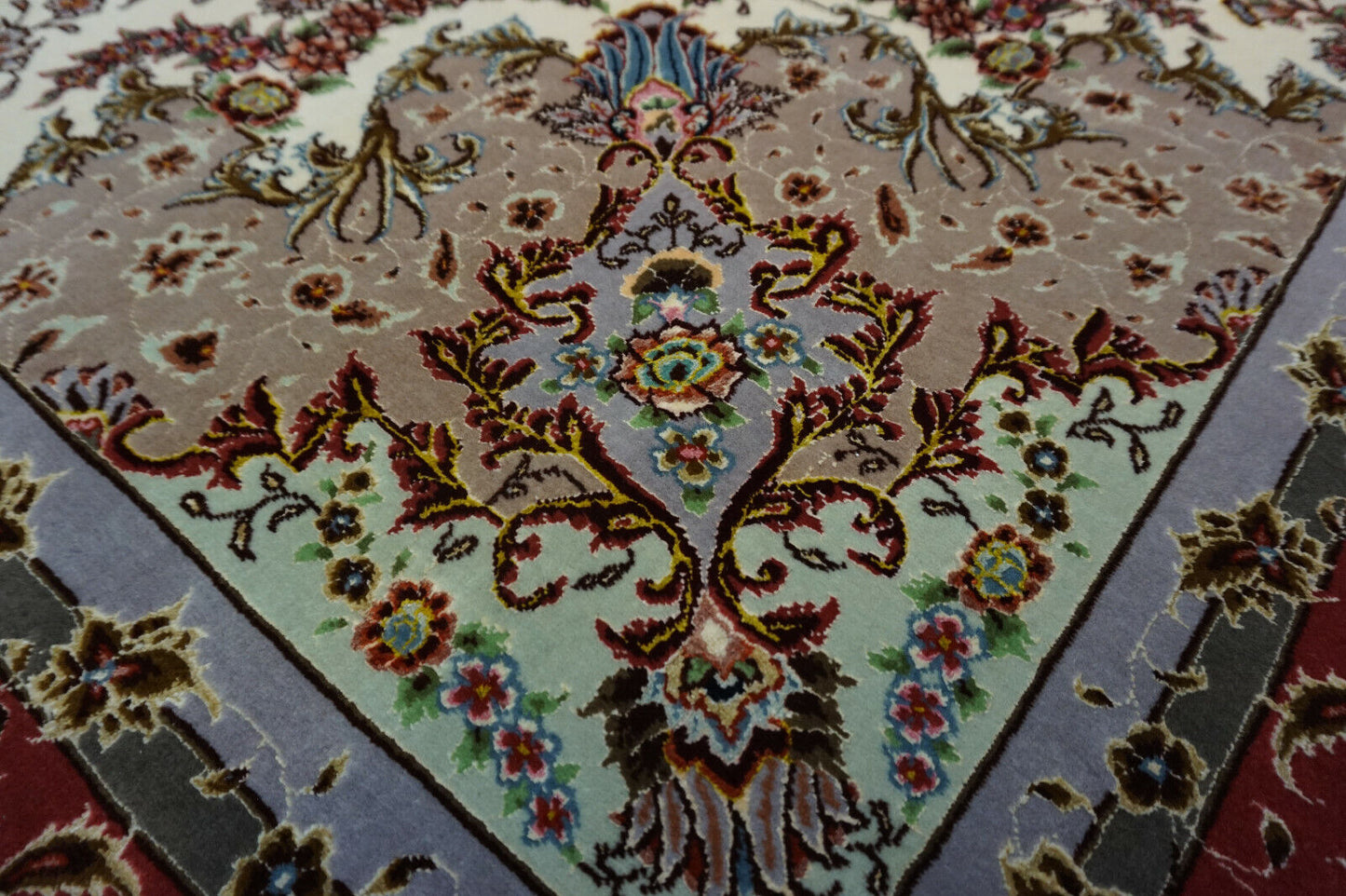 Side view of the Persian Tabriz rug highlighting its rectangular shape and size